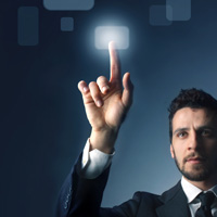 Businessman pointing to lighted button